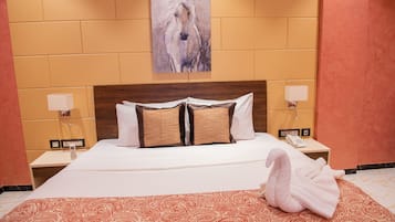 Literie de qualité supérieure, matelas mémoire de forme, minibar