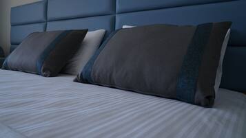 Premium bedding, down duvets, Select Comfort beds, minibar