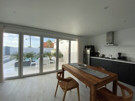 Deluxe Apartment, 1 Bedroom, Ensuite, Pool View (Pool View) | Private kitchen | Full-size fridge, microwave, stovetop, toaster