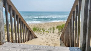 A wooden staircase leading to a beach with a view of the ocean. - Serendipity - Oceanfront, Duck, 5 BR, 4.5BA, Private Pool & Hot Tub (Duck)