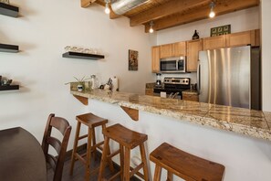 Fridge, microwave, oven, stovetop - Updated Pet Friendly Condo - Walk to Main Street - Central AC (Durango)