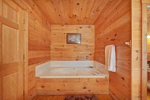 Combined shower/bathtub, hair dryer, towels, soap