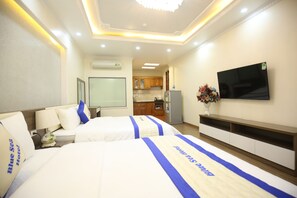 Desk, blackout curtains, iron/ironing board, rollaway beds