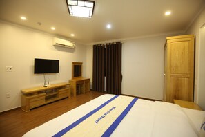 Desk, blackout curtains, iron/ironing board, rollaway beds