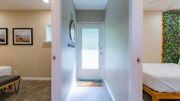 2 bedrooms, desk, iron/ironing board, travel crib