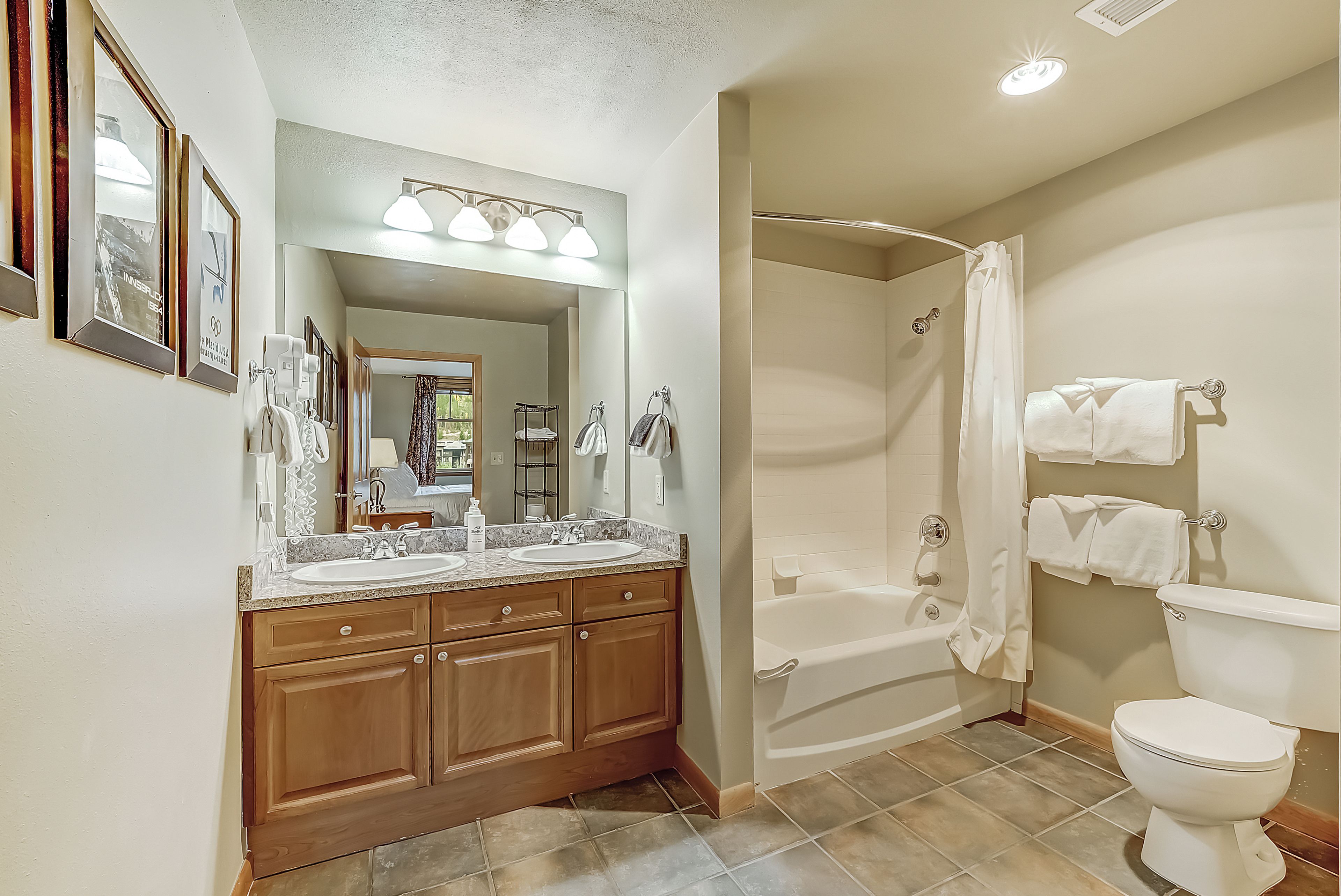 Freshen up in your spacious private bathroom off of the primary bedroom