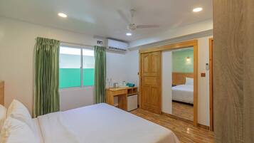 Standard Room, Multiple Beds | Premium bedding, individually furnished, soundproofing, free WiFi