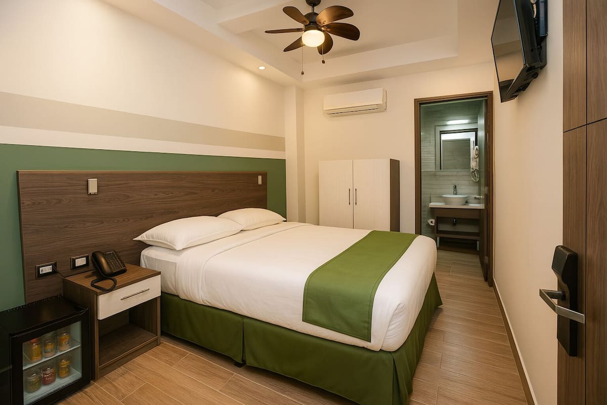 Standard Double Room | Minibar, in-room safe, individually decorated, individually furnished