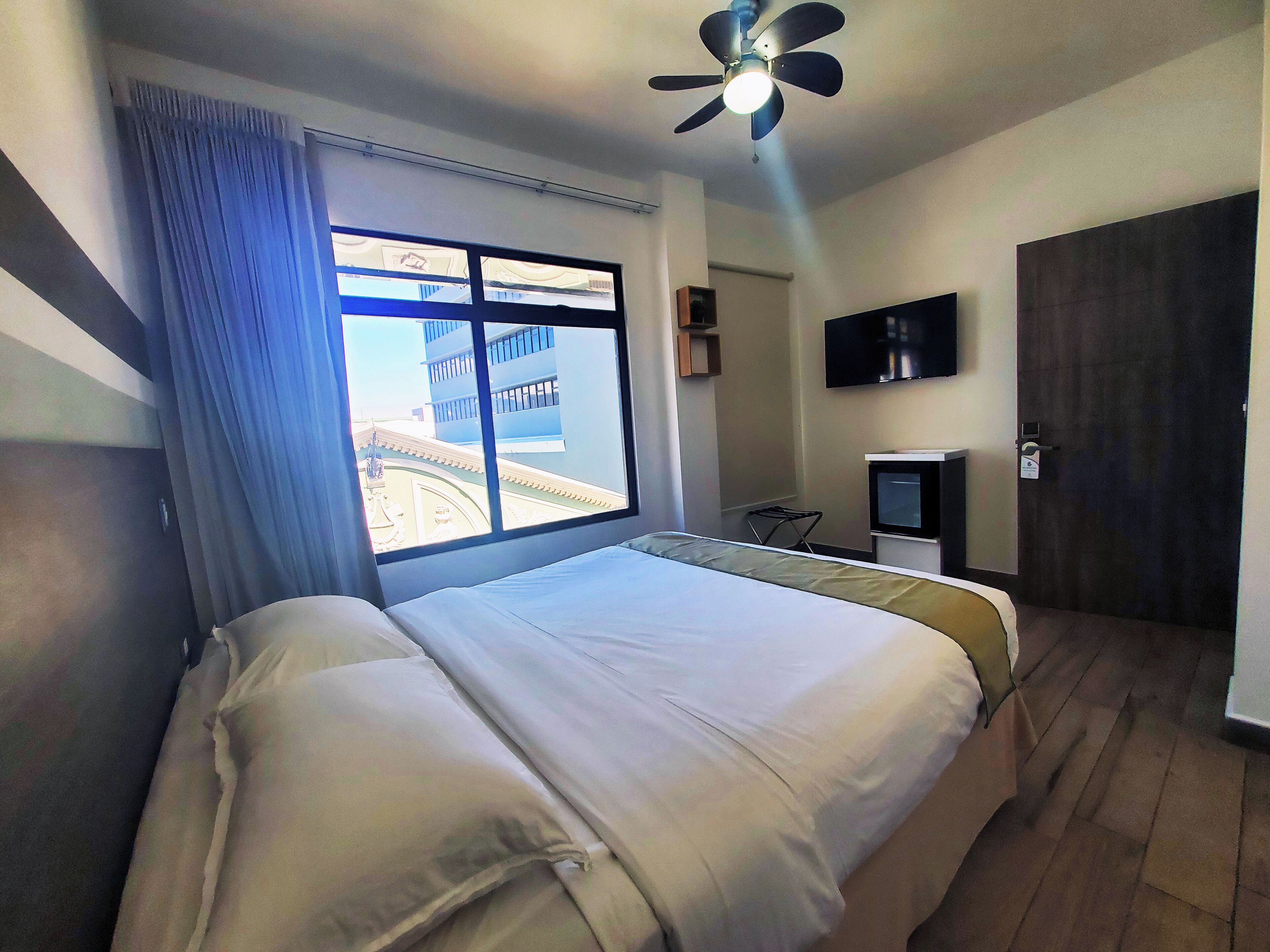 deluxe room | 1 bedroom, minibar, in-room safe, individually decorated