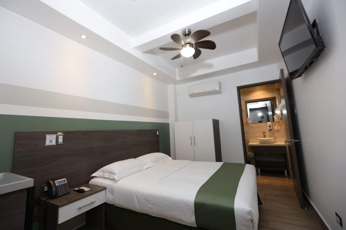 Standard Double Room | Minibar, in-room safe, individually decorated, individually furnished