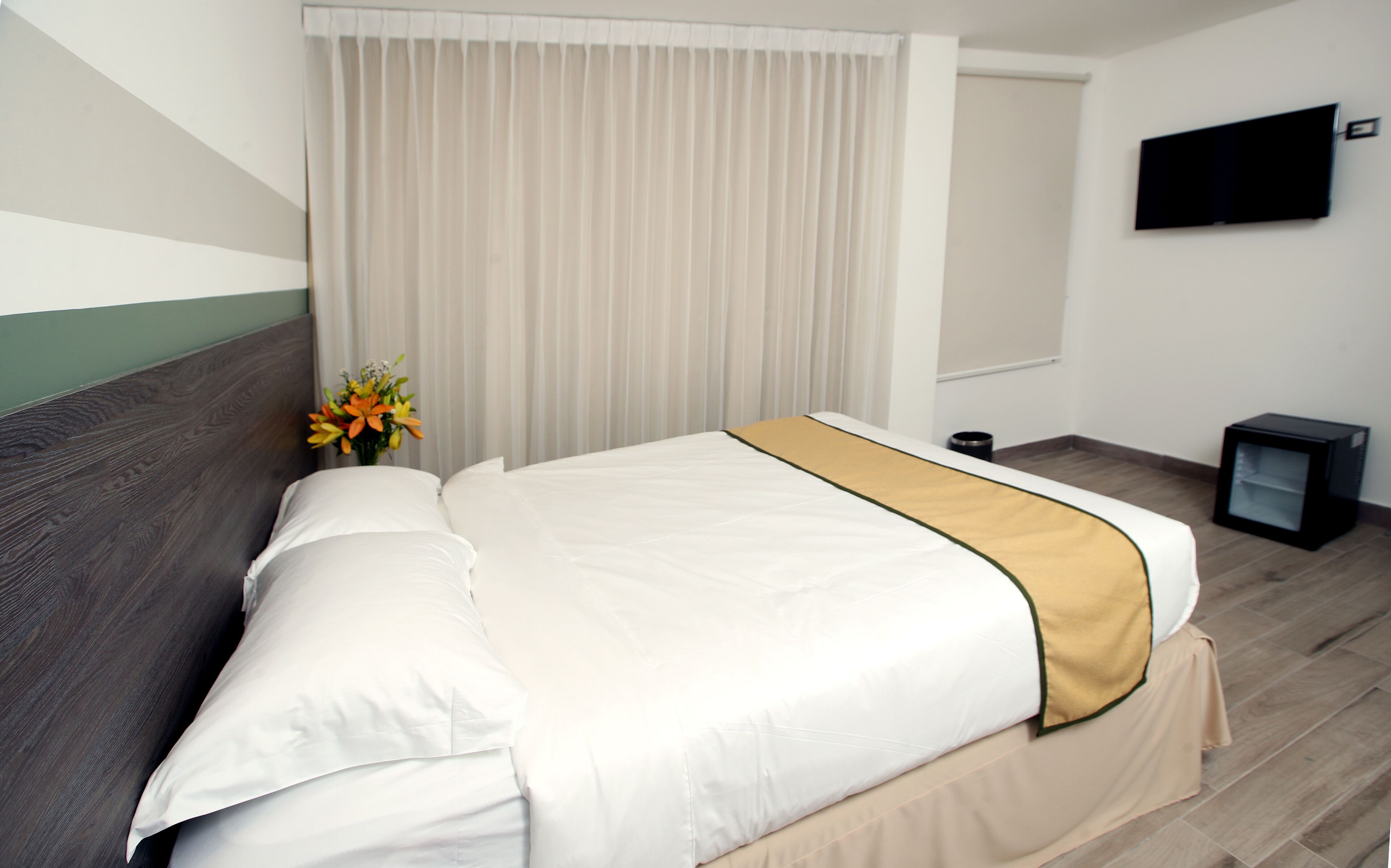deluxe room | 1 bedroom, minibar, in-room safe, individually decorated