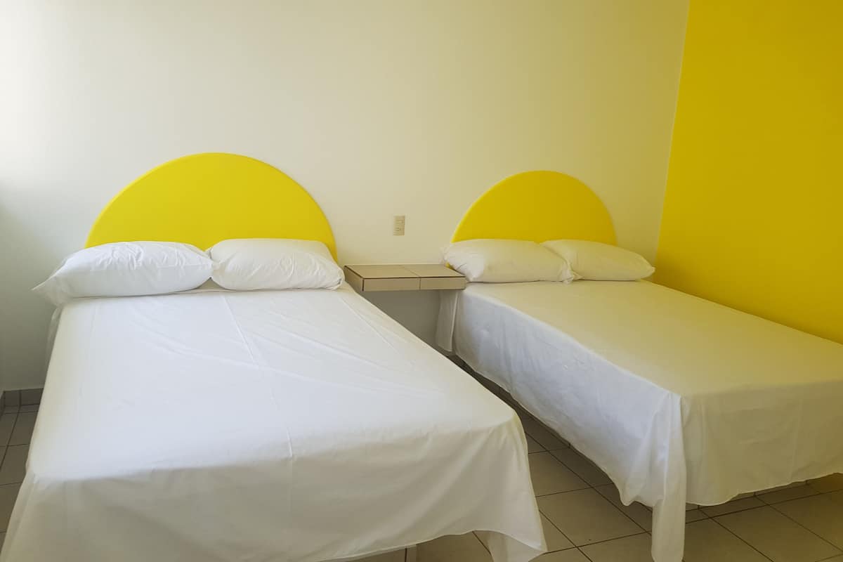 Chambre quadruple classique | Accès au Wi-Fi (inclus), literie fournie