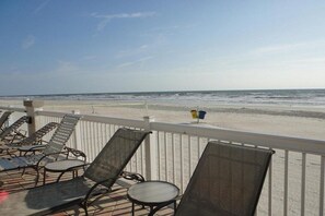 On the beach, sun loungers, beach towels