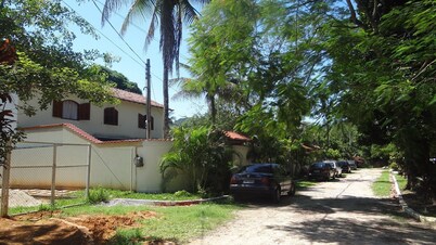 2,500m2 property with a two-story house, swimming pool, lake, soccer field, and barbecue area.