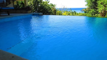 Classic Triple Room, Pool View | Exterior detail