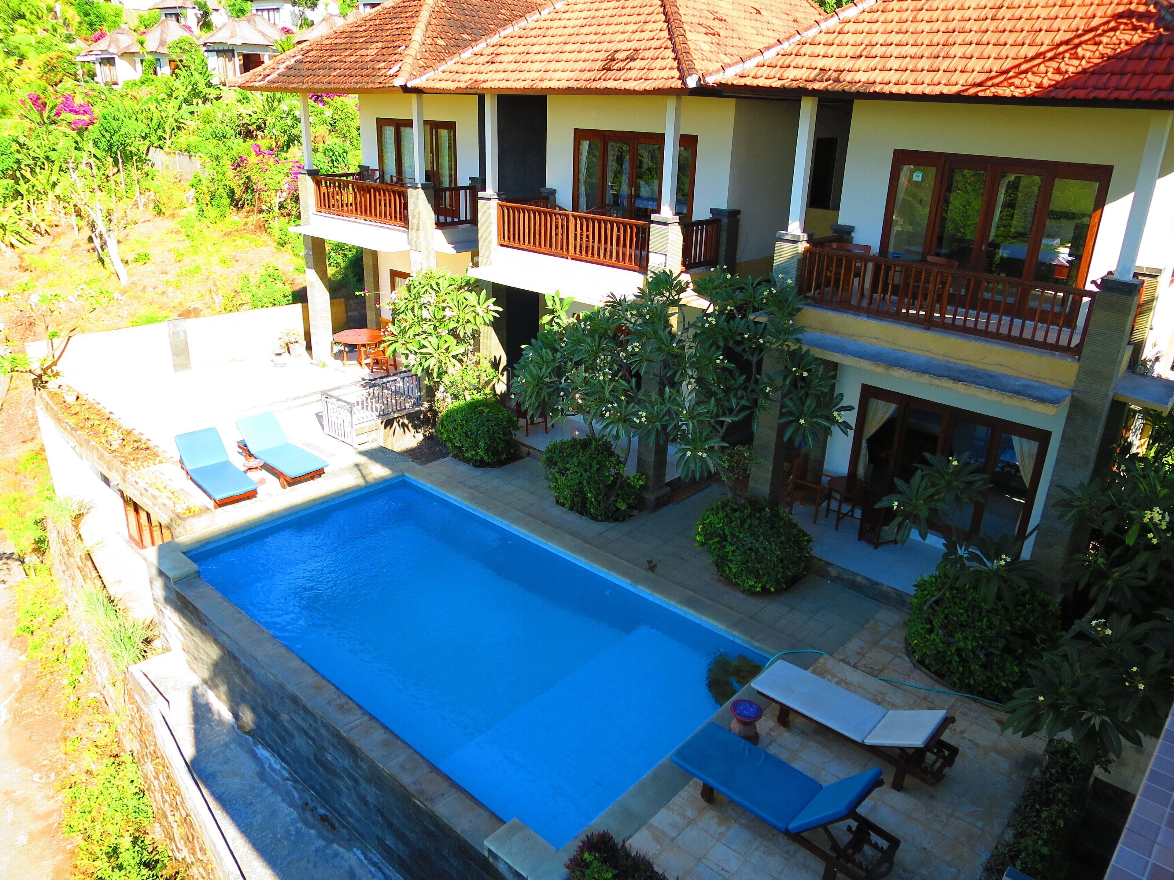 Pool | 2 outdoor pools, pool umbrellas, sun loungers