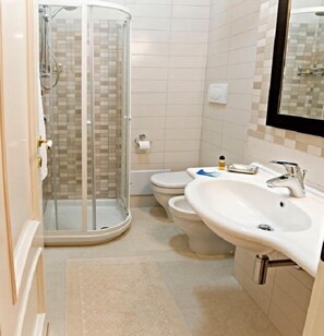 Hair dryer, bidet, towels, soap