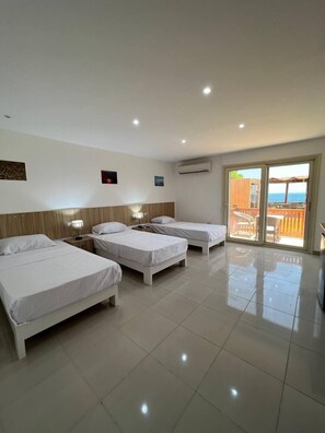 Deluxe triple room | Äänieristys, vuodevaatteet