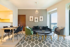 Deluxe appartement | Woonruimte | Een flatscreentelevisie