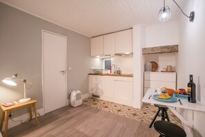 Fridge, stovetop, electric kettle, toaster