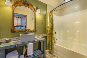 Combined shower/tub, hair dryer, towels, soap