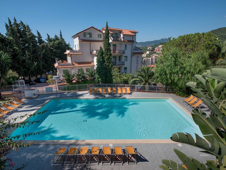 Seasonal outdoor pool, open 9:00 AM to 7:00 PM, pool umbrellas