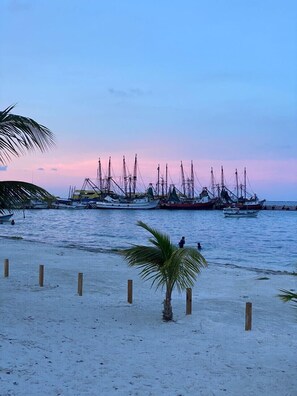 On the beach, sun-loungers, beach towels