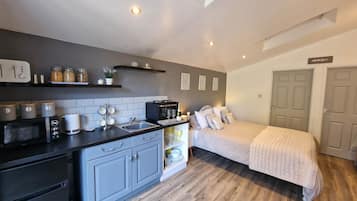 1 dormitorio, tabla de planchar con plancha, wifi gratis y ropa de cama