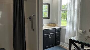 Shower, hair dryer, towels, soap