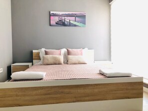 Apartment, 1 Bedroom | Soundproofing, iron/ironing board, free cribs/infant beds, free WiFi