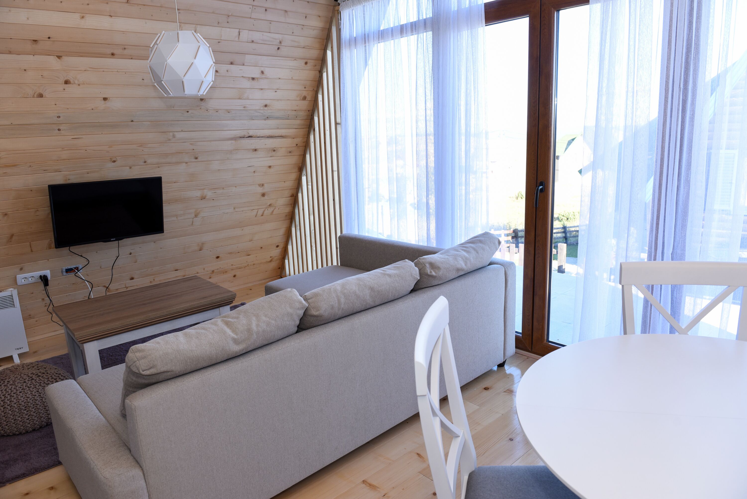 Apartamento, 1 habitación | Zona de estar | Una televisión de pantalla plana