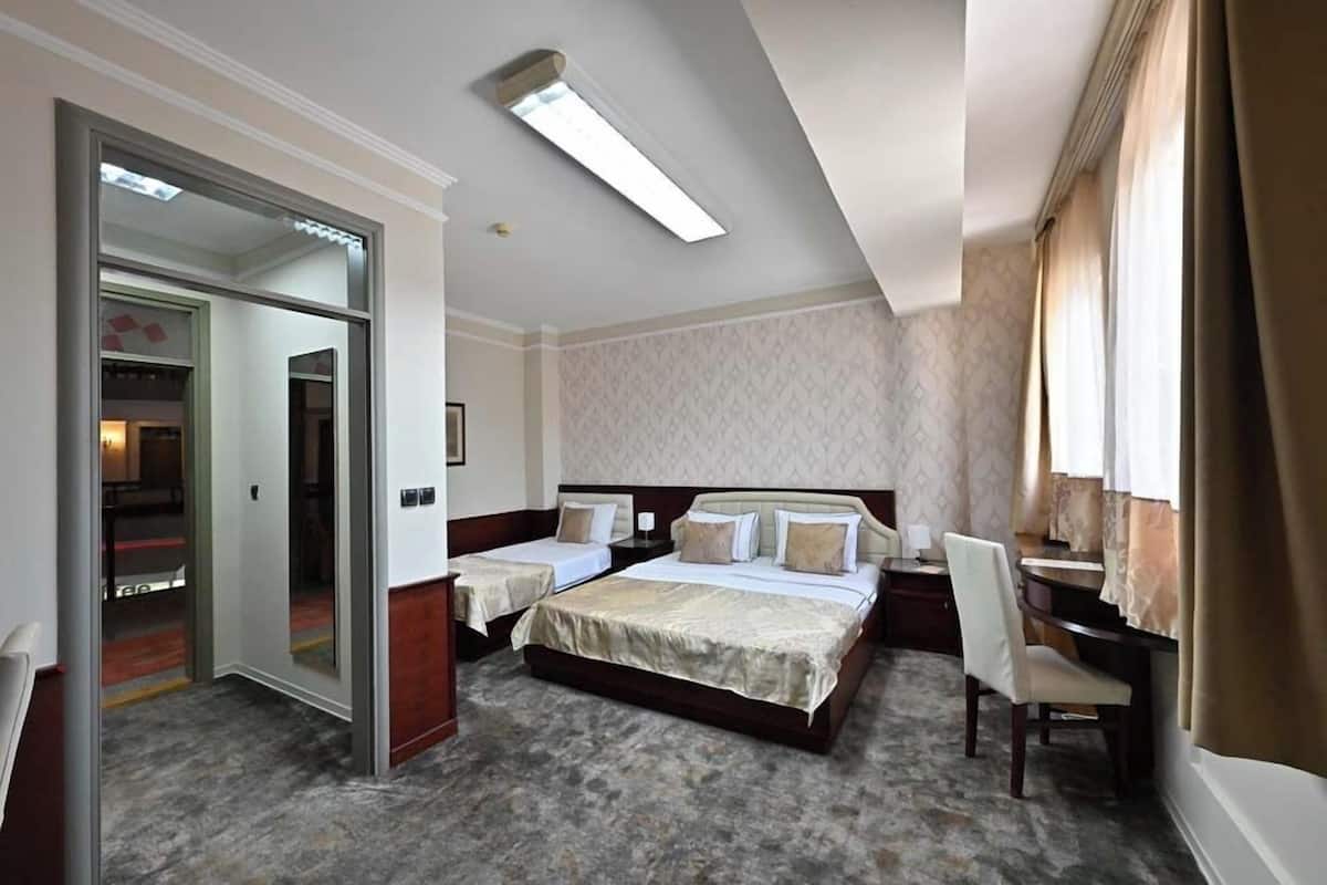 Senior Double Room | 1 bedroom, minibar, in-room safe, desk