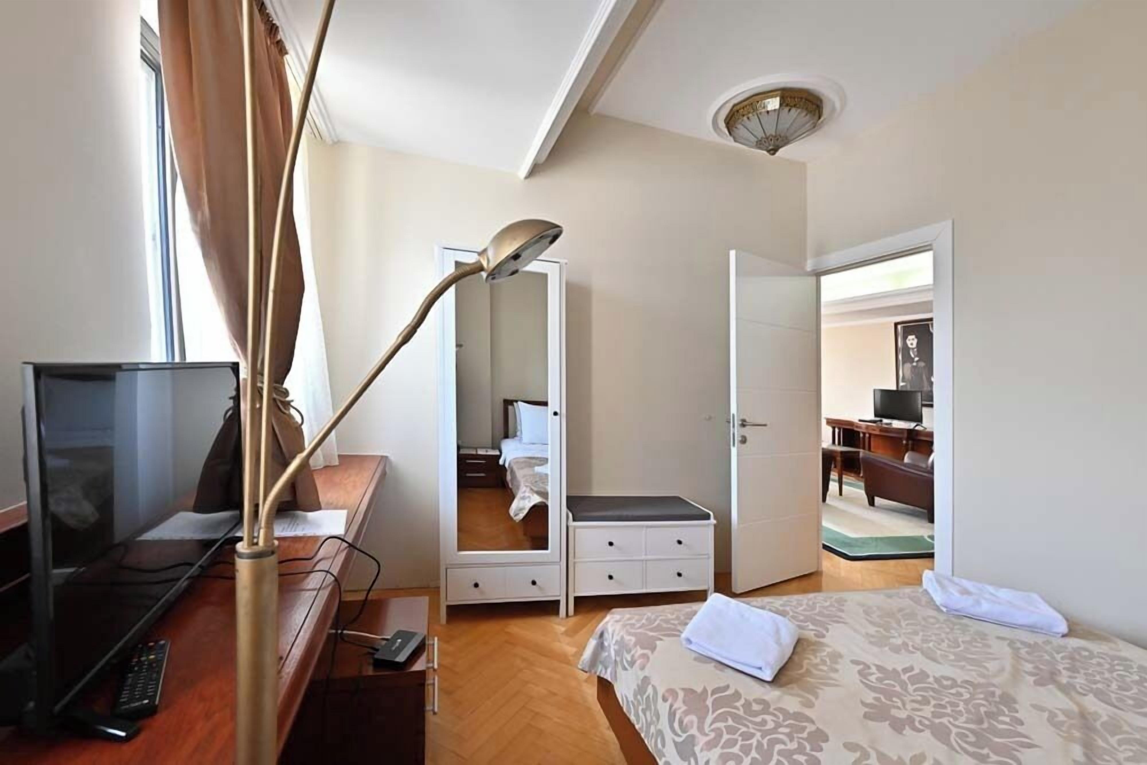 Deluxe Double Room, 2 Bedrooms | Minibar, in-room safe, desk, laptop workspace