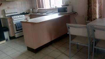 Fridge, microwave, electric kettle, toaster