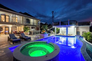 Outdoor pool, an infinity pool, sun loungers