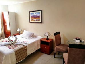Laptop workspace, blackout curtains, free WiFi, bed sheets