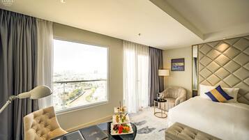 Premier Luxury King Room, Balcony City View | Minibar, in-room safe, desk, blackout drapes
