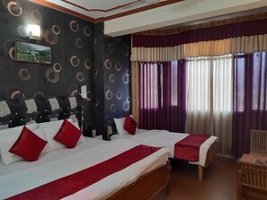 Habitación triple Deluxe