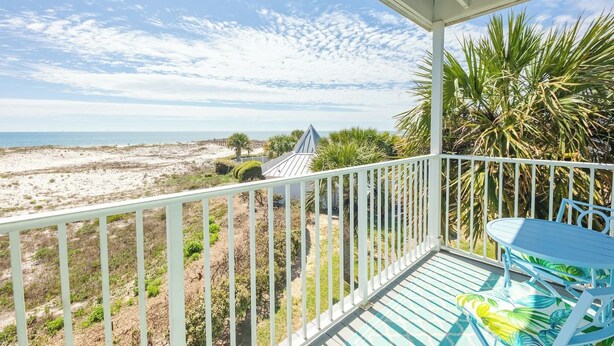 A balcony with a view of the beach and ocean. - Beachfront, Indoor Pool & Hot Tub (Gulf Shores)