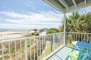 A balcony with a view of the beach and ocean. - Beachfront, Indoor Pool & Hot Tub (Gulf Shores)