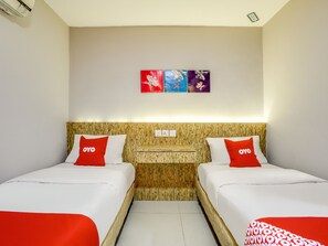 Habitación estándar con 2 camas individuales | Wifi gratis y ropa de cama