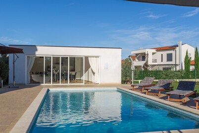 Nice holiday home with heated pool near the sea