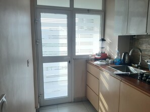 Economy-Apartment, 1 Schlafzimmer | 2 Schlafzimmer, Zimmersafe, individuell dekoriert