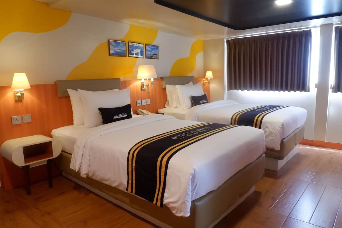 Executive-rum - 2 enkelsängar - havsutsikt | Minibar, värdeförvaringsskåp på rummet och individuell inredning