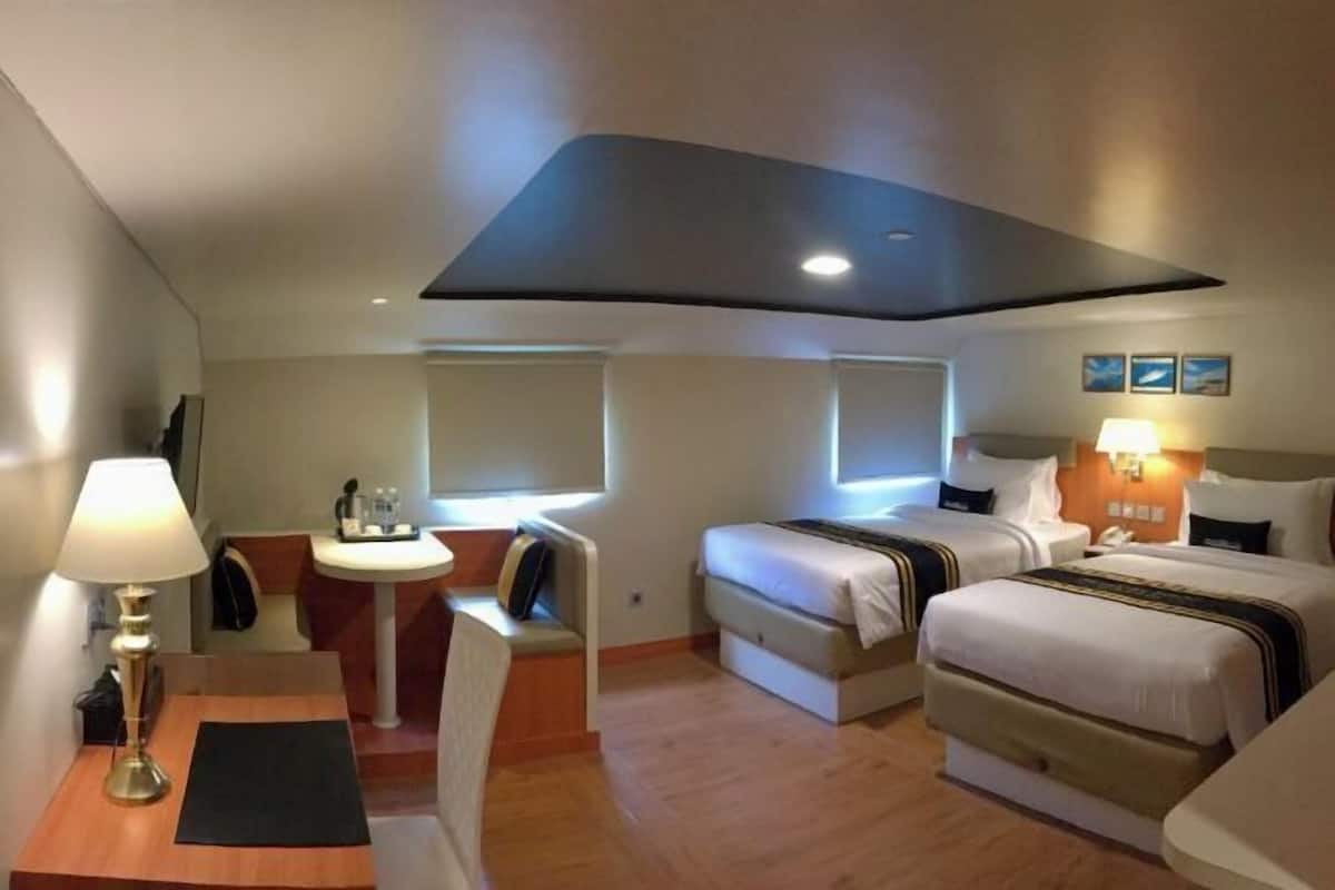 Minibar, värdeförvaringsskåp på rummet och individuell inredning