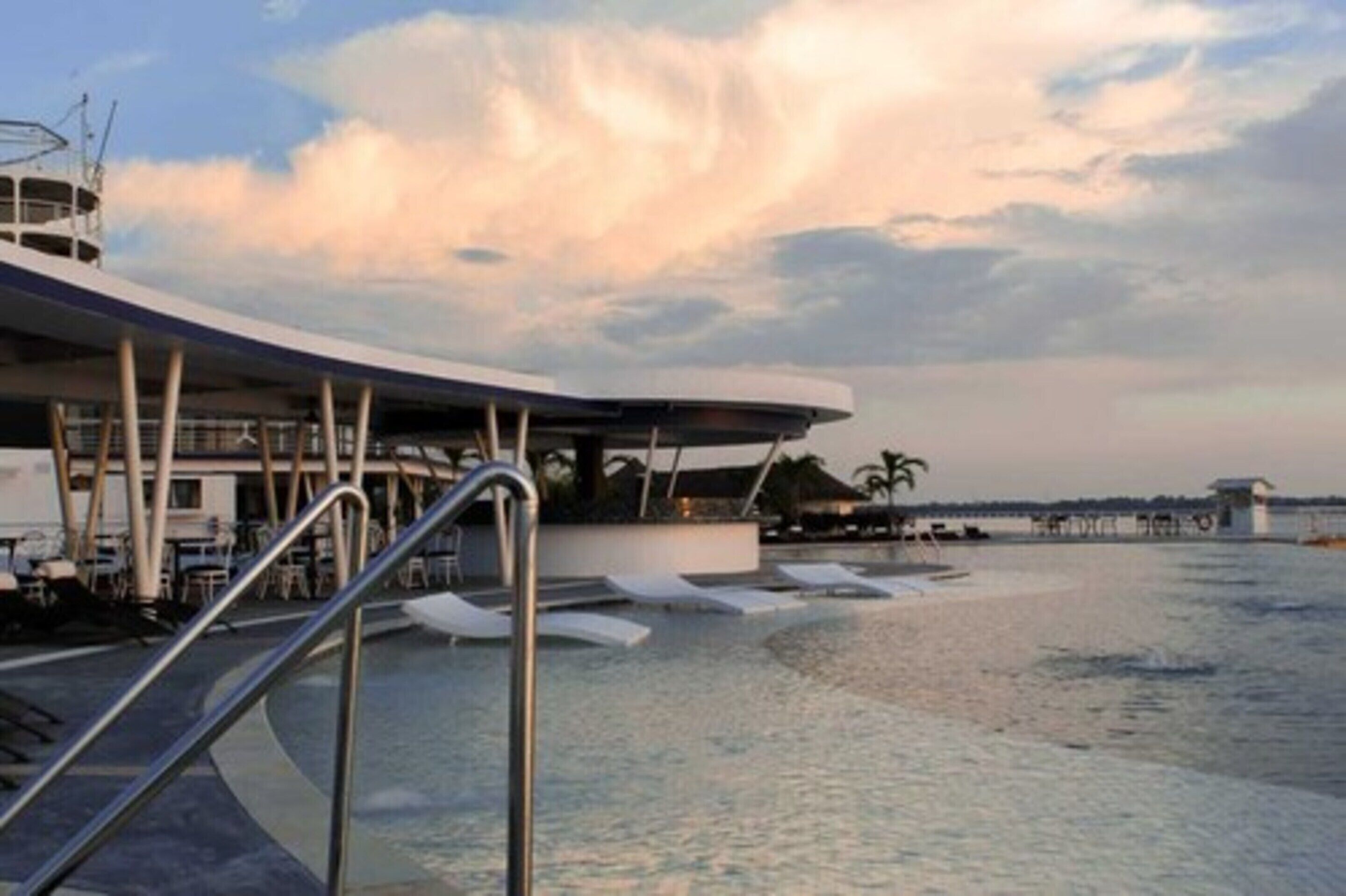 Outdoor pool, open 8:00 AM to 8:00 PM, sun loungers