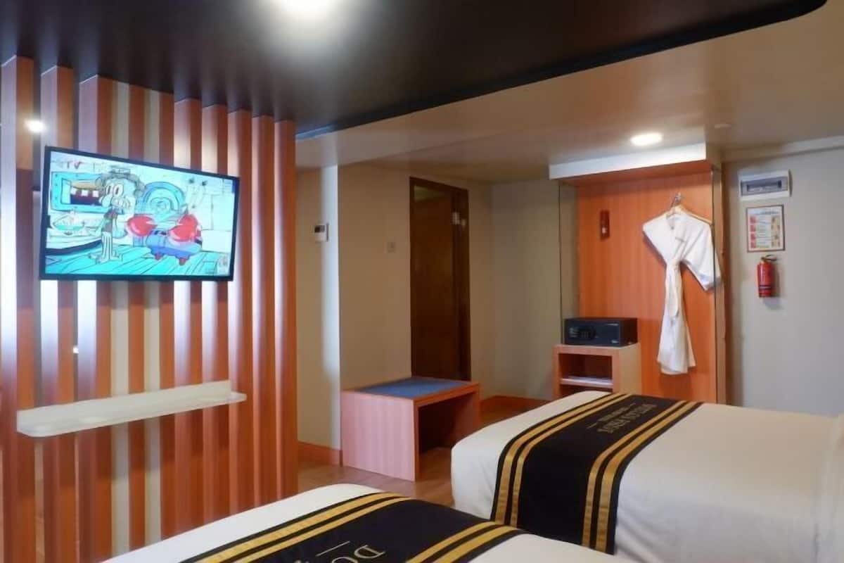 Minibar, värdeförvaringsskåp på rummet och individuell inredning