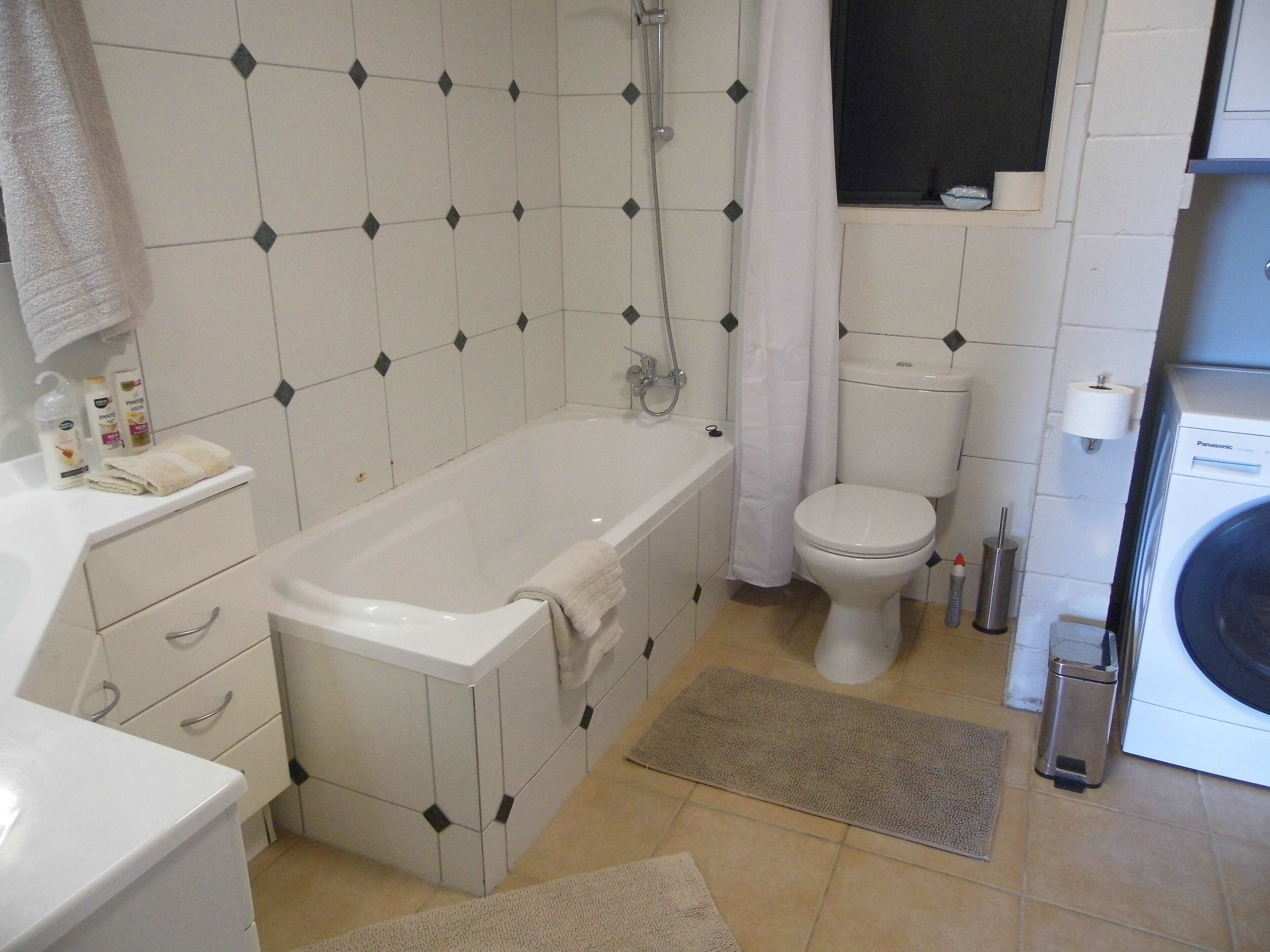 Combined shower/bathtub, hair dryer, towels, soap