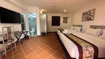 Family Room | Premium bedding, in-room safe, desk, blackout curtains