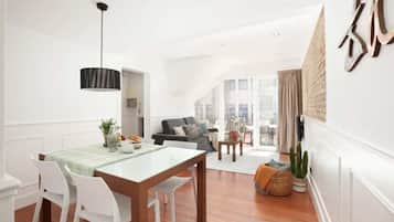 Penthouse, Terraza | Área de sala de estar | Televisión de pantalla plana